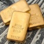 Gold rises after moody’s downgrades us credit rating