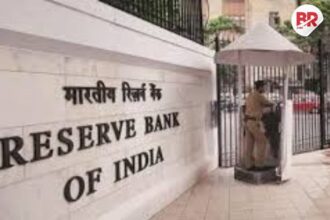 India’s central bank cuts interest rates to help economy grow